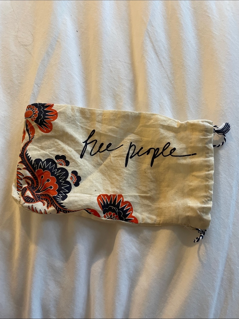 Free People Cream Drawstring Pouch with Navy & Orange Floral Motif, dust bag - Picture 1 of 3
